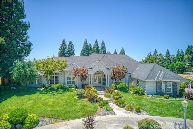 2457 Remington Ct, Merced, CA 95340 - view of front facade with french doors and a front lawn