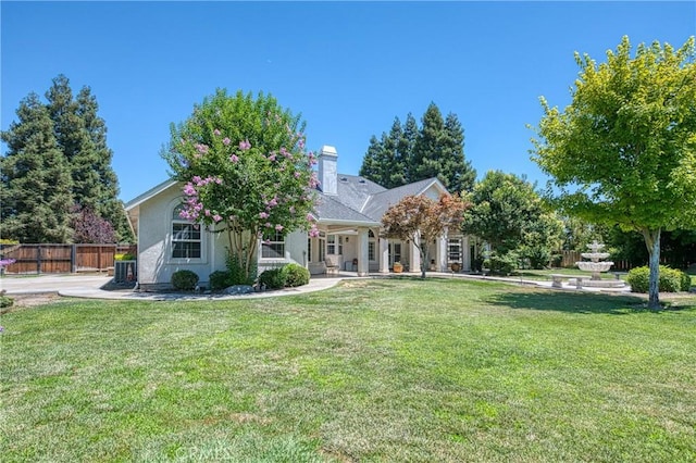 2457 Remington Ct, Merced, CA 95340 - view of property hidden behind natural elements featuring a chimney