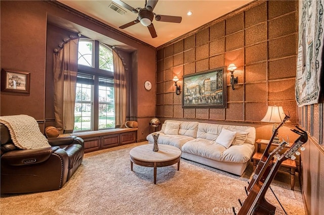 2457 Remington Ct, Merced, CA 95340 - carpeted living area with ceiling fan and ornamental molding