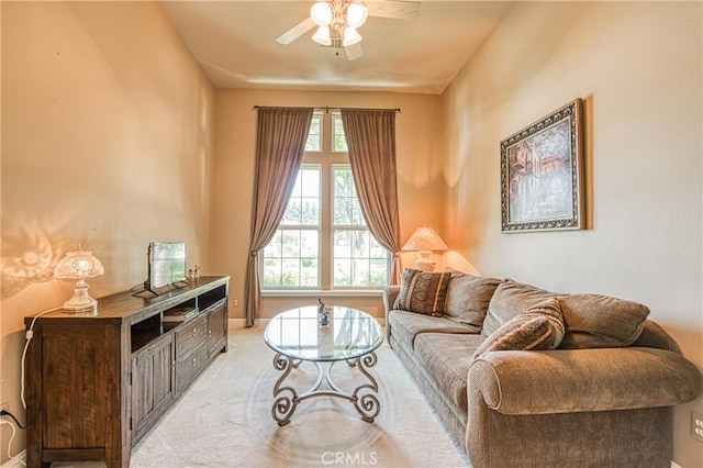2457 Remington Ct, Merced, CA 95340 - living area with ceiling fan and light colored carpet