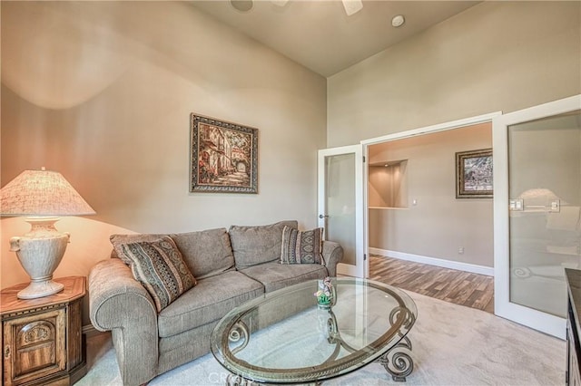 2457 Remington Ct, Merced, CA 95340 - living area with french doors, high vaulted ceiling, a ceiling fan, and wood finished floors