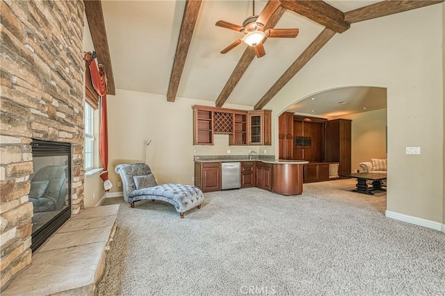 2457 Remington Ct, Merced, CA 95340 - living room with high vaulted ceiling, light carpet, arched walkways, a ceiling fan, and wet bar