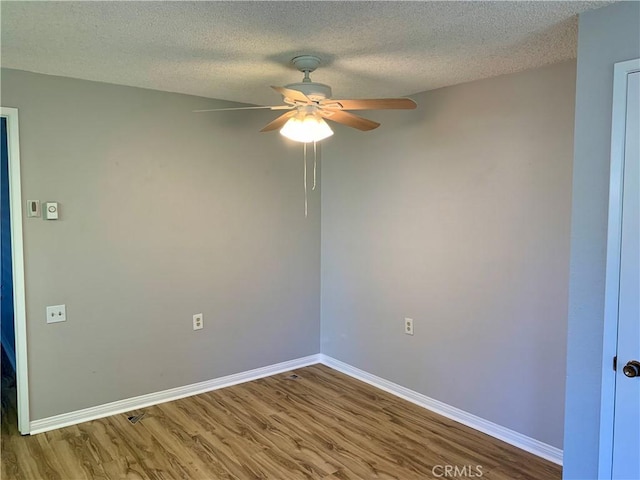 930 Avenida Majorca Unit A, Laguna Woods, CA 92637 - unfurnished room featuring wood finished floors, a ceiling fan, and a textured ceiling