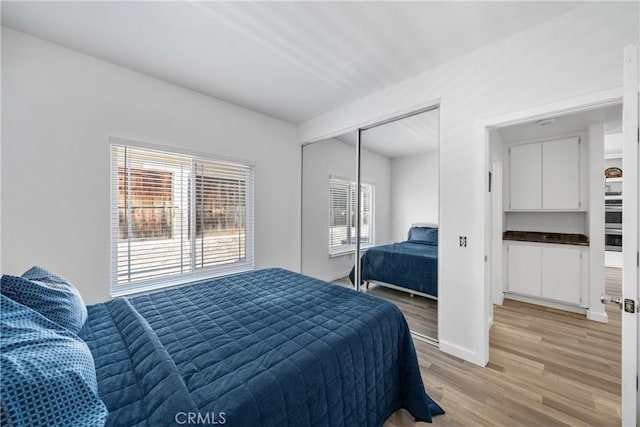 2981 Pembroke Cir, Corona, CA 92879 - bedroom featuring light wood finished floors and a closet
