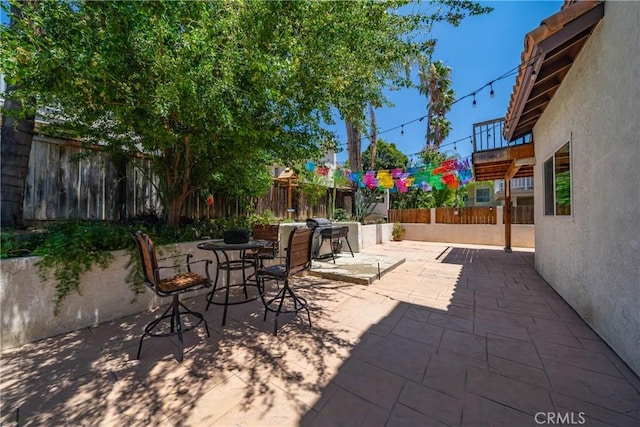 2981 Pembroke Cir, Corona, CA 92879 - fenced backyard with a patio and outdoor dining space
