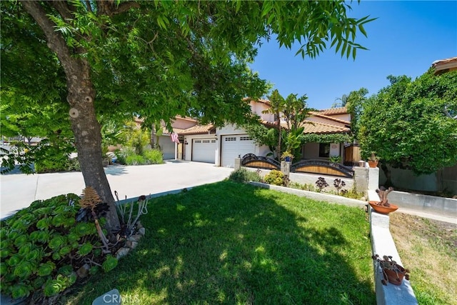 2981 Pembroke Cir, Corona, CA 92879 - view of front facade with a front yard, driveway, a tile roof, an attached garage, and stucco siding