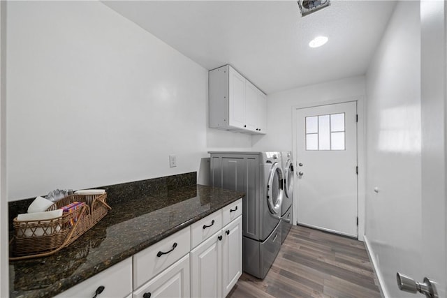 2981 Pembroke Cir, Corona, CA 92879 - laundry area with washer and clothes dryer, cabinet space, and dark wood-style floors
