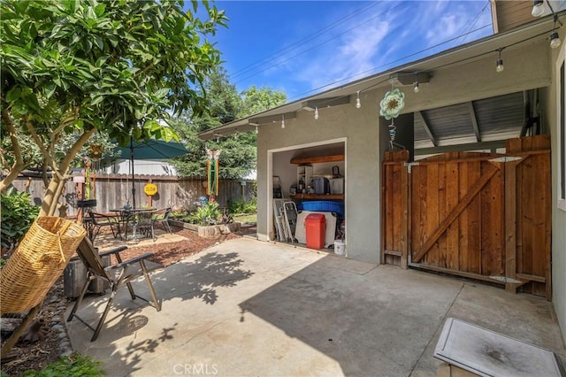 401 W 6th Ave, Chico, CA 95926 - view of patio with a gate and outdoor dining space