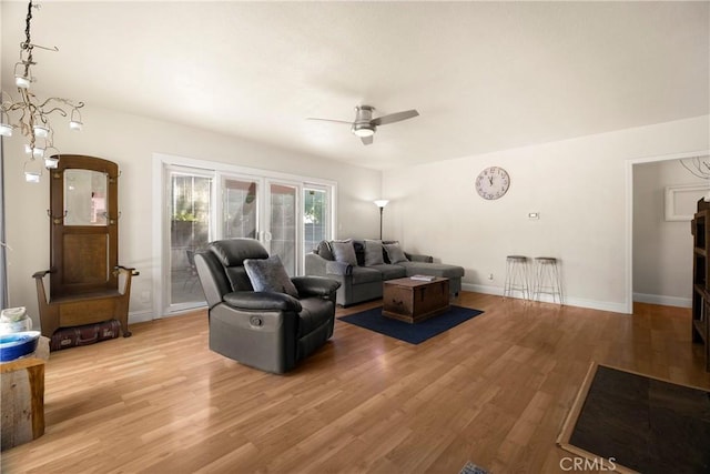 401 W 6th Ave, Chico, CA 95926 - living room with a ceiling fan and light wood-style flooring