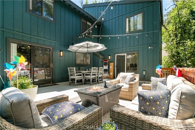 248 Hemlock Dr, Lake Arrowhead, CA 92352 - view of patio / terrace with an outdoor living space with a fire pit and outdoor dining area