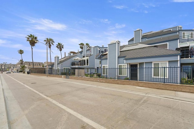 804 N The Strand Unit 11, Oceanside, CA 92054 - view of concrete road with a residential view and street lighting