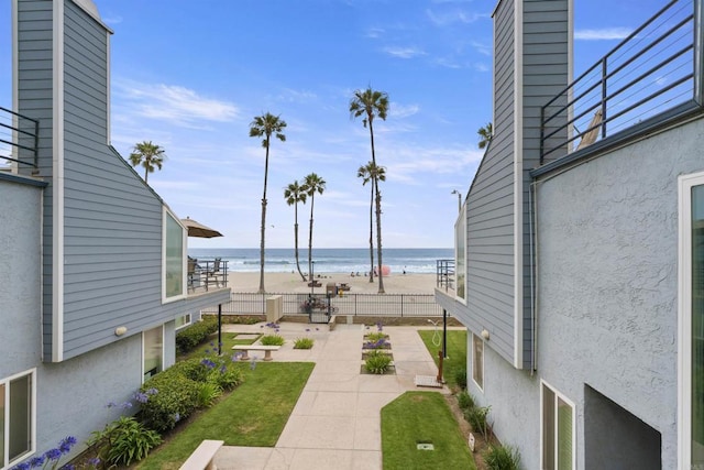 804 N The Strand Unit 11, Oceanside, CA 92054 - view of yard with view of water and beach and a patio area