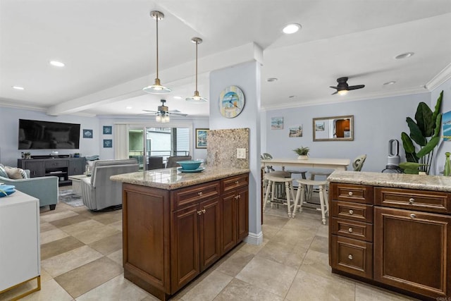 804 N The Strand Unit 11, Oceanside, CA 92054 - kitchen with a ceiling fan, ornamental molding, recessed lighting, decorative light fixtures, and open floor plan