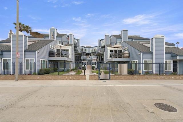 804 N The Strand Unit 11, Oceanside, CA 92054 - view of building exterior with a residential view