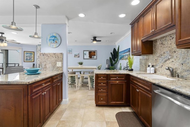 804 N The Strand Unit 11, Oceanside, CA 92054 - kitchen with dishwasher, ceiling fan, a peninsula, ornamental molding, and backsplash