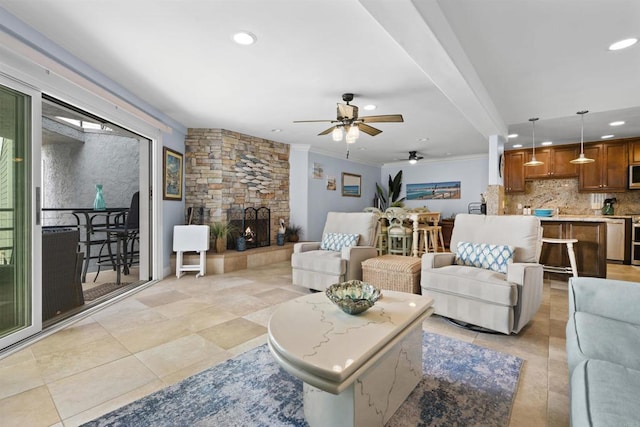 804 N The Strand Unit 11, Oceanside, CA 92054 - living area featuring recessed lighting, ceiling fan, a fireplace, ornamental molding, and light tile patterned flooring