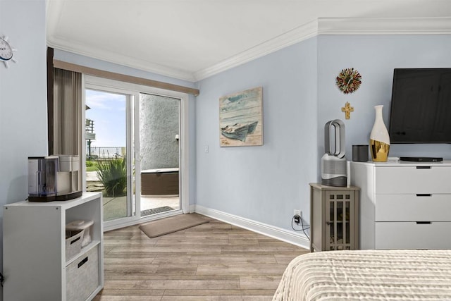 804 N The Strand Unit 11, Oceanside, CA 92054 - bedroom featuring access to outside, ornamental molding, and light wood-type flooring