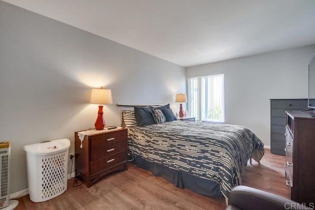 8036 Linda Vista Rd Unit 1F, San Diego, CA 92111 - bedroom featuring wood finished floors