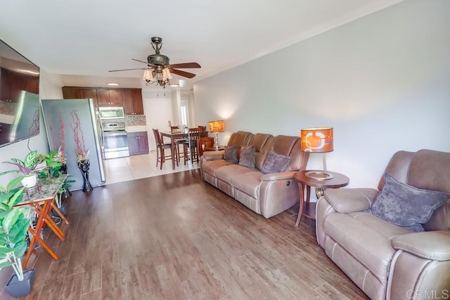 8036 Linda Vista Rd Unit 1F, San Diego, CA 92111 - living area with ceiling fan and light wood-style floors