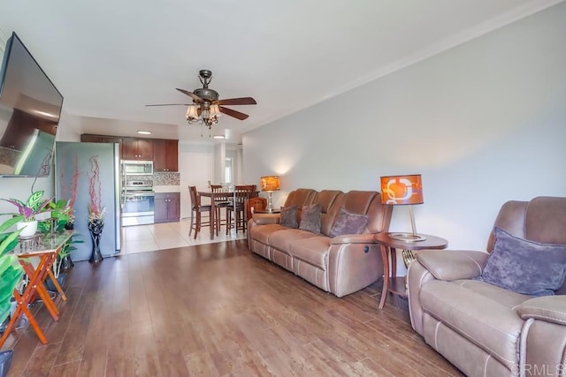 8036 Linda Vista Rd Unit 1F, San Diego, CA 92111 - living area with a ceiling fan and light wood-type flooring