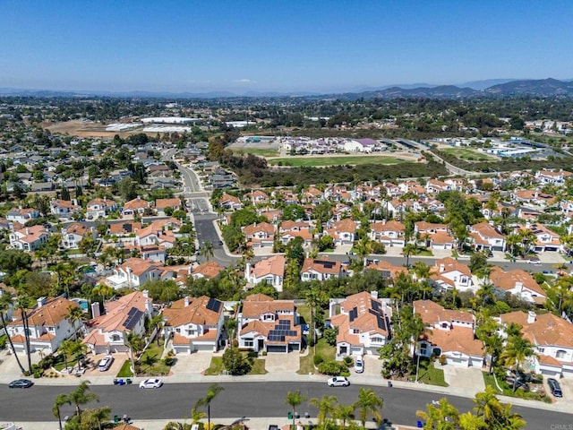 4926 Colusa Dr, Oceanside, CA 92056 - aerial view of property and surrounding area featuring nearby suburban area and a mountain backdrop
