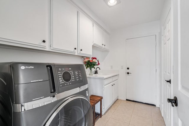 4926 Colusa Dr, Oceanside, CA 92056 - washroom with cabinet space, light tile patterned floors, and separate washer and dryer