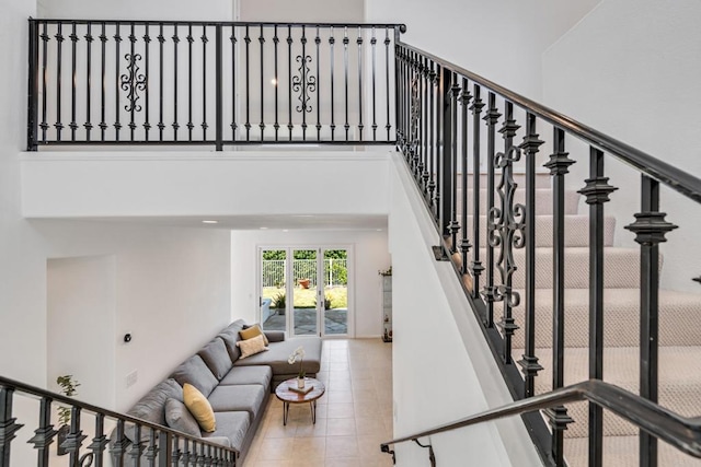 4926 Colusa Dr, Oceanside, CA 92056 - stairway featuring a high ceiling and tile patterned floors