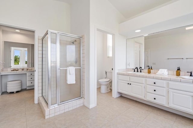 4926 Colusa Dr, Oceanside, CA 92056 - full bathroom with double vanity, a shower stall, tile patterned floors, high vaulted ceiling, and recessed lighting