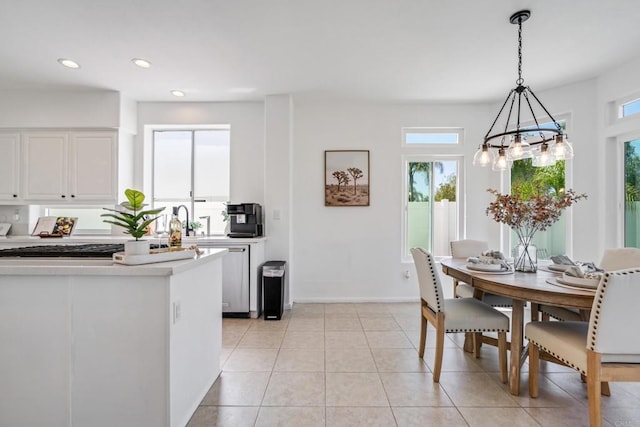 4926 Colusa Dr, Oceanside, CA 92056 - dining space featuring a chandelier, recessed lighting, and light tile patterned floors