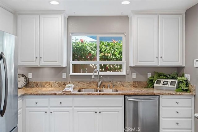 448 Grove Ln, Nipomo, CA 93444 - kitchen featuring appliances with stainless steel finishes, white cabinets, recessed lighting, and light stone countertops