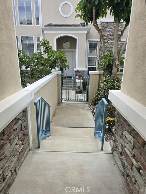 11 Chandon, Newport Coast, CA 92657 - property entrance featuring stucco siding