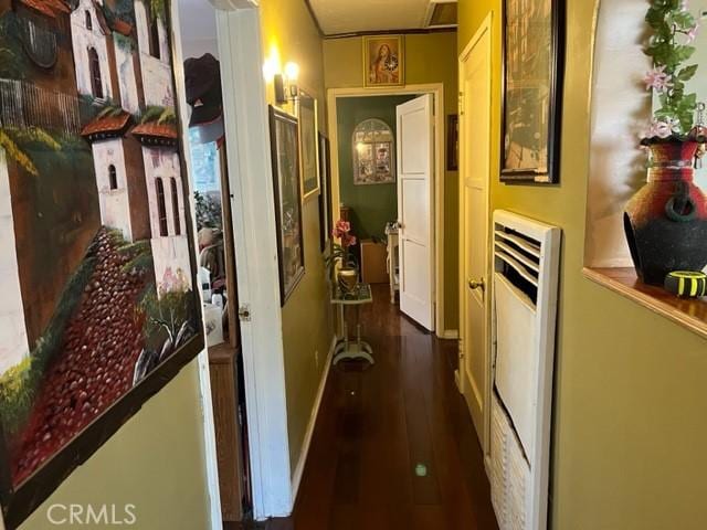 13567 Eldridge Ave, Sylmar, CA 91342 - corridor with radiator and dark wood-type flooring