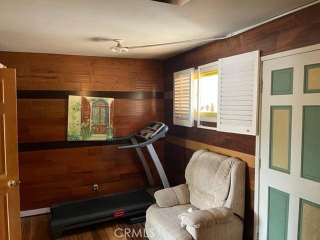 13567 Eldridge Ave, Sylmar, CA 91342 - exercise room featuring wood walls and wood finished floors
