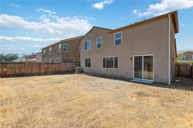 6648 E Yale, Fresno, CA 93727 - rear view of property with a fenced backyard and stucco siding