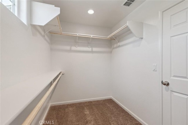 6648 E Yale, Fresno, CA 93727 - spacious closet featuring carpet flooring
