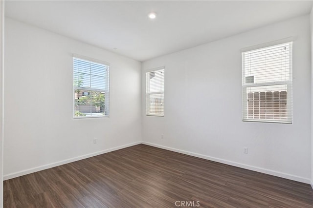 6648 E Yale, Fresno, CA 93727 - spare room with dark wood-style floors and recessed lighting