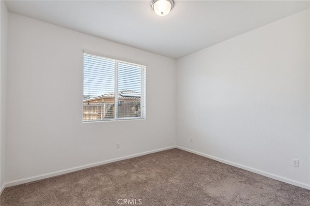 6648 E Yale, Fresno, CA 93727 - carpeted empty room with baseboards