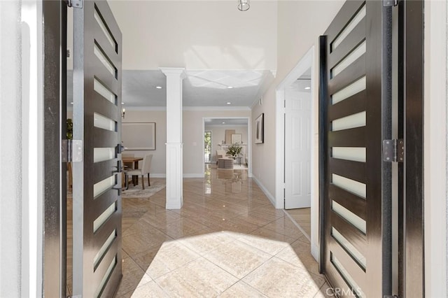 16186 Mount Gist Cir, Fountain Valley, CA 92708 - entrance foyer featuring ornate columns, crown molding, recessed lighting, and light tile patterned flooring
