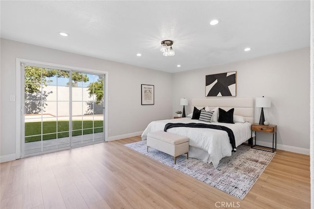 16186 Mount Gist Cir, Fountain Valley, CA 92708 - bedroom featuring access to exterior, recessed lighting, and wood finished floors