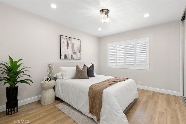 16186 Mount Gist Cir, Fountain Valley, CA 92708 - bedroom with light wood-type flooring and recessed lighting