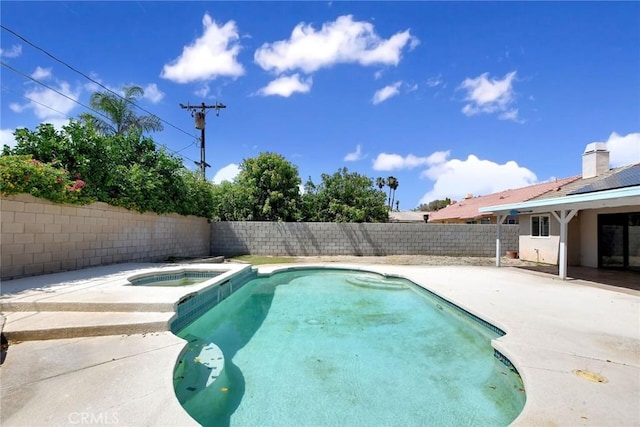 31121 Avenida Ximino, Cathedral City, CA 92234 - view of swimming pool featuring a fenced backyard, a patio, and a pool with connected hot tub