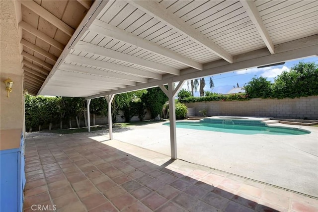 31121 Avenida Ximino, Cathedral City, CA 92234 - view of swimming pool featuring a fenced backyard, a patio, and a pool with connected hot tub
