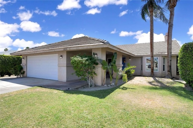 31121 Avenida Ximino, Cathedral City, CA 92234 - ranch-style house with stucco siding, a garage, concrete driveway, and a front yard