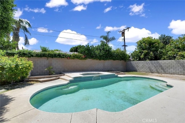 31121 Avenida Ximino, Cathedral City, CA 92234 - view of pool featuring an in-ground hot tub and a fenced backyard