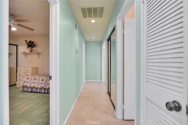 31121 Avenida Ximino, Cathedral City, CA 92234 - corridor with light tile patterned floors and baseboards