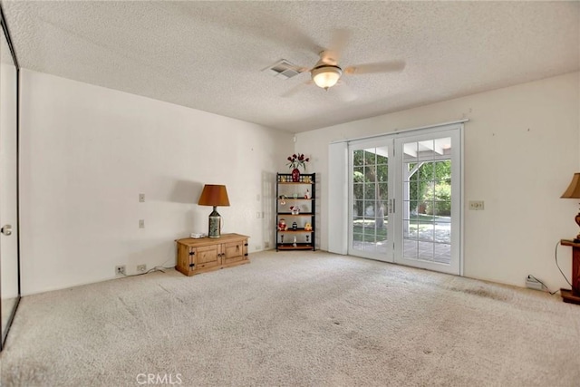 31121 Avenida Ximino, Cathedral City, CA 92234 - carpeted empty room with a ceiling fan and a textured ceiling