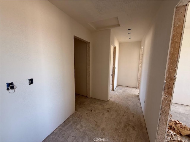 9570 Mescalero Rd, Phelan, CA 92371 - corridor featuring light colored carpet and attic access