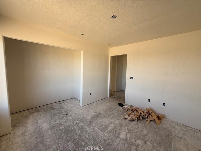 9570 Mescalero Rd, Phelan, CA 92371 - spare room featuring a textured ceiling