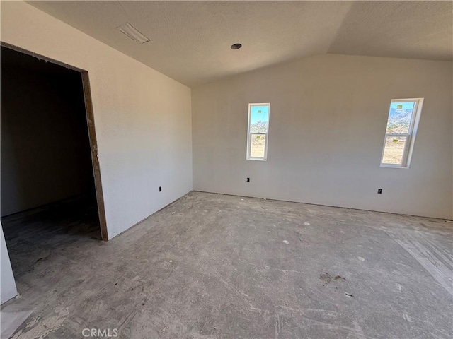 9570 Mescalero Rd, Phelan, CA 92371 - spare room with lofted ceiling and plenty of natural light