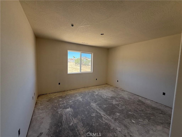 9570 Mescalero Rd, Phelan, CA 92371 - spare room with a textured ceiling